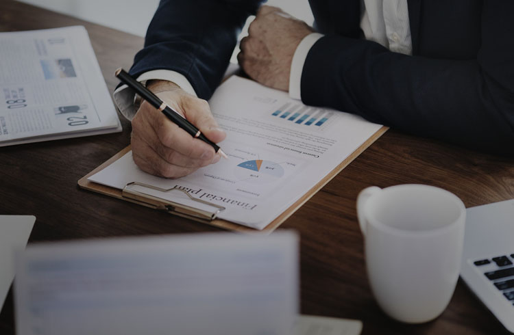 man writing firm statistics